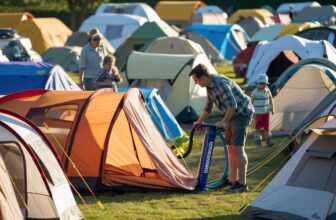 a lot of tents in a field