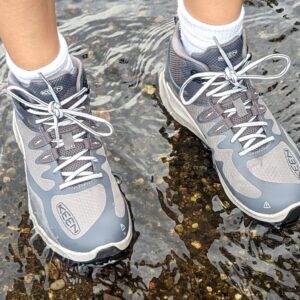 Keen Zionic boots paddling in shallow water