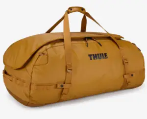 golden coloured holdall with golden straps