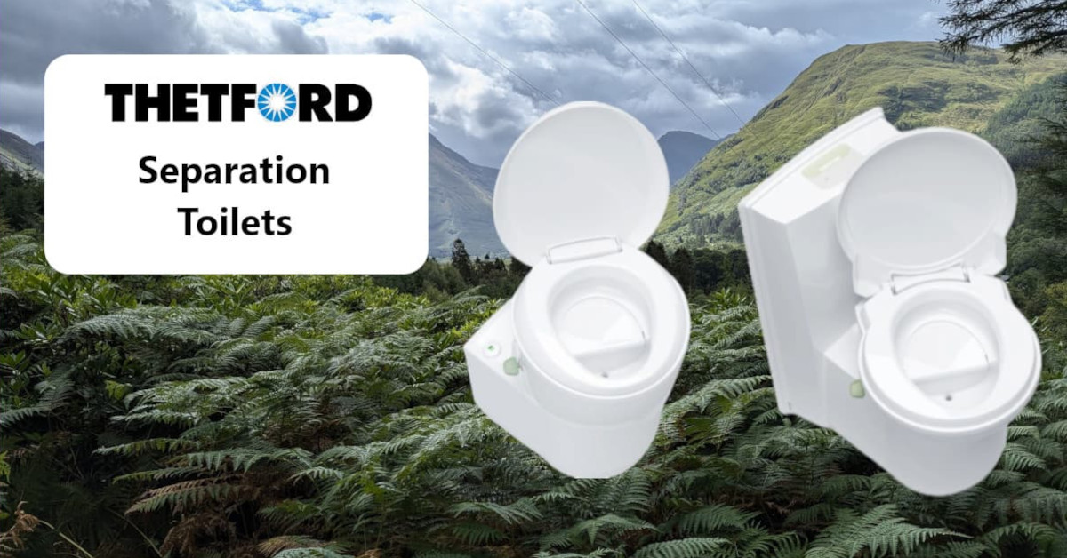 Thetford Separation Toilets nestled in the ferns on a forest hillside.