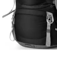 a black rucksack with grey trim. The rucksack has bed roll straps visible.